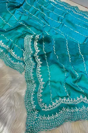 PARTY WEAR DESIGNER SAREES WITH HAND  EMBELLISHED STONES AND WORK